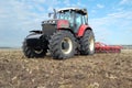 Tractor makes tillage Royalty Free Stock Photo