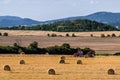 Tractor making hay bales Royalty Free Stock Photo