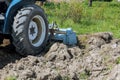 By tractor milling, the soil is loosening and ground in preparation for planting.