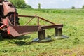 Tractor mounted rotary mower during operation, fragment close-up