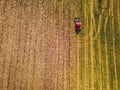 Tractor mowing agricultural  field. Aerial view.  Cultivating field. Royalty Free Stock Photo