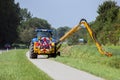 Tractor Mowing Roadside Shoulder Royalty Free Stock Photo