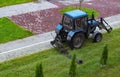 Tractor mows lawn grass in doldorogi in the city Royalty Free Stock Photo