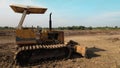 Tractor on a muddy road Royalty Free Stock Photo