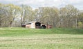 A Tractor in an Old Barn House Royalty Free Stock Photo