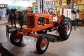 Tractor is parked inside a garage Royalty Free Stock Photo