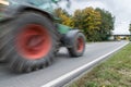 Tractor passing by on a national highway, Germany Royalty Free Stock Photo