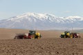 Farm equipment planting potatoes in an Idaho farm field. Royalty Free Stock Photo