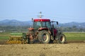 Tractor planting seeds