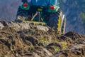 Tractor with plough plow close up