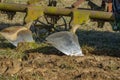 Tractor with plough plow close up