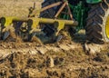 Tractor with plough plow close up