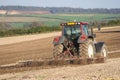 Tractor ploughing field