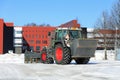 Tractor Ploughing Snow and Spreading Grit Royalty Free Stock Photo