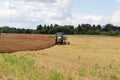 Tractor plow autumn field stork Royalty Free Stock Photo