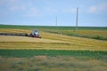 Tractor and plow on farm Royalty Free Stock Photo