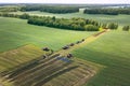 Tractors with plow on soil cultivating. tractor bowling field, drone view. Cultivated plant soil tillage. Agricultural Royalty Free Stock Photo