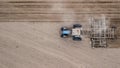 Tractor plowing field from right to left top view. Agriculture. Tillage