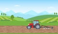 Tractor plowing the field on rural landscape background. Agriculture concept.