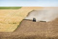 Tractor Plowing the Fields of Eastern Washington. Royalty Free Stock Photo