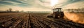 tractor plowing through fields, preparing the soil for spring planting, showcasing the mechanized side of modern