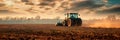 tractor plowing through fields, preparing the soil for spring planting, showcasing the mechanized side of modern