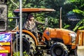 Tractor are plowing to adjust the area for football field and parking. Abstract blur. Royalty Free Stock Photo