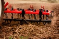 Tractor preparing land for sowing out in the field