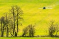 Tractor preparing spring agriculture field and using insecticide which help for the soil