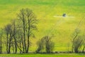 Tractor preparing spring agriculture field and using insecticide which help for the soil