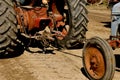 Tractor pulling another tractor which is stalled