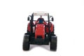 Tractor red toy on white Royalty Free Stock Photo