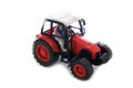 Tractor red toy on white Royalty Free Stock Photo