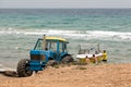 Tractor retrieving a boat from the water