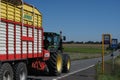 Tractor ride on the road 1 Royalty Free Stock Photo