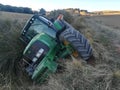 Tractor rolled over in the harvest