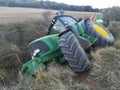 Tractor rolled over in the harvest