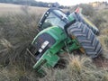 Tractor rolled over in the harvest