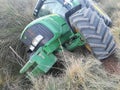 Tractor rolled over in the harvest