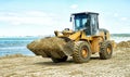 Tractor on the sea beach