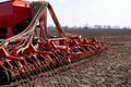 Tractor with seeder in the field in early spring Royalty Free Stock Photo