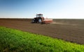 Tractor and seeder for sowing corn