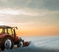 Tractor Snow Blower blowing away heavy snowfall Royalty Free Stock Photo