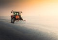 Tractor Snow Blower blowing away heavy snowfall Royalty Free Stock Photo