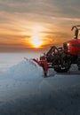 Tractor Snow Blower blowing away heavy snowfall Royalty Free Stock Photo