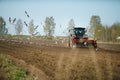 Tractor sowing field Royalty Free Stock Photo