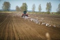 Tractor sowing field Royalty Free Stock Photo