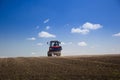 Tractor Spaying a field in the spring Royalty Free Stock Photo