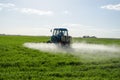 Tractor spray fertilize field pesticide chemical Royalty Free Stock Photo