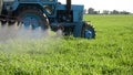 Tractor spray herbicide